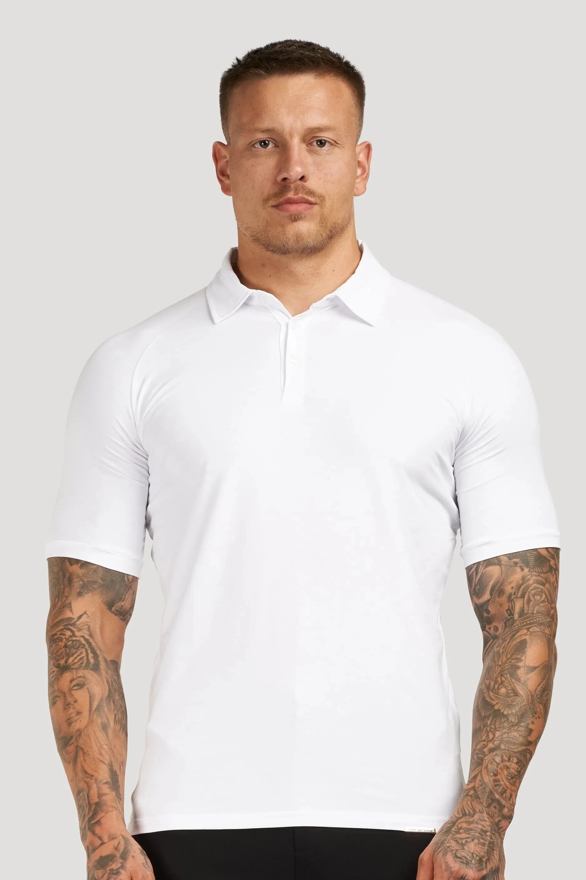 THE MUSCLE BUTTON POLO